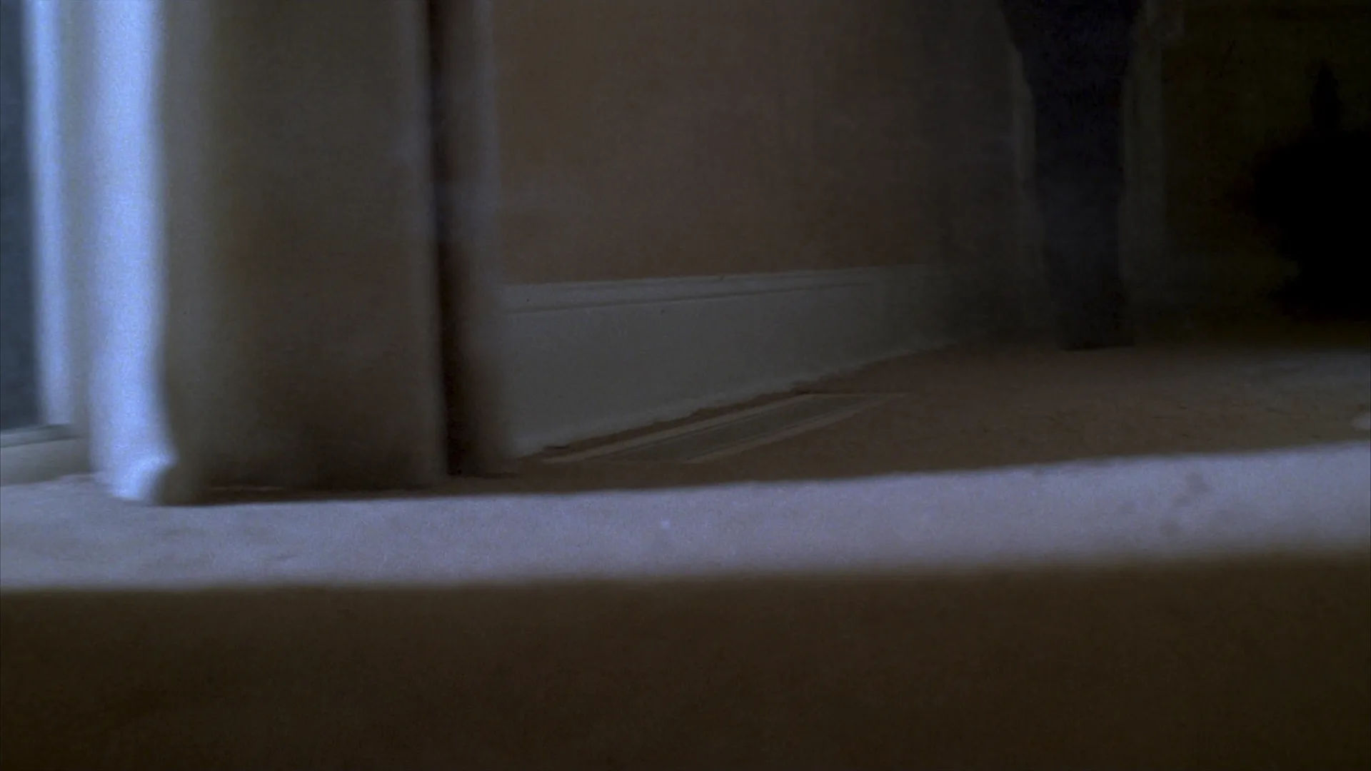 Cold air coming from a floor vent in a hallway on a winter morning